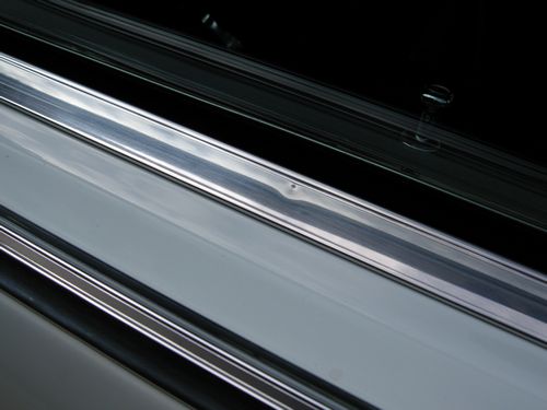 Passenger Side - Window Trim Ding